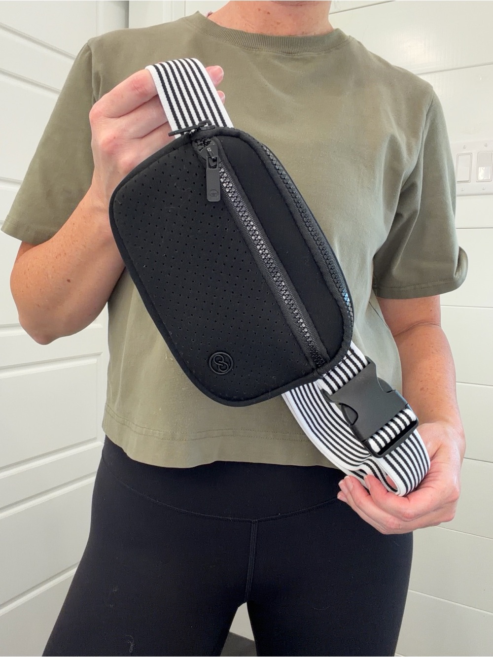Black Perforated Crossbody Belt Bag with Striped Strap